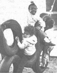 Children playing on playground structure